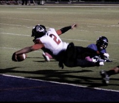 Football Player Diving